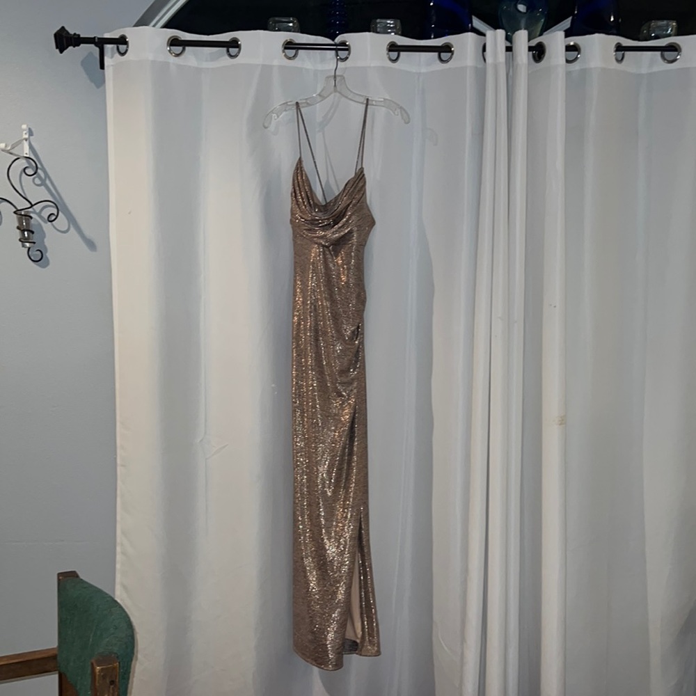 This is a Morgan & Co rose gold prom dress size 20 from David’s bridal